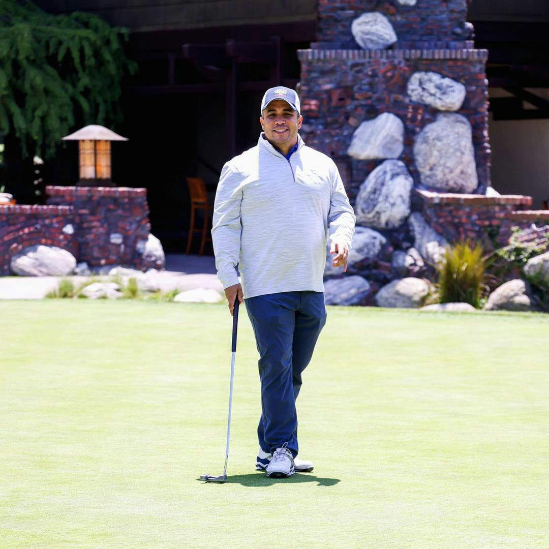 Bukitt's team member Hernán playing golf at Torrey Pines.