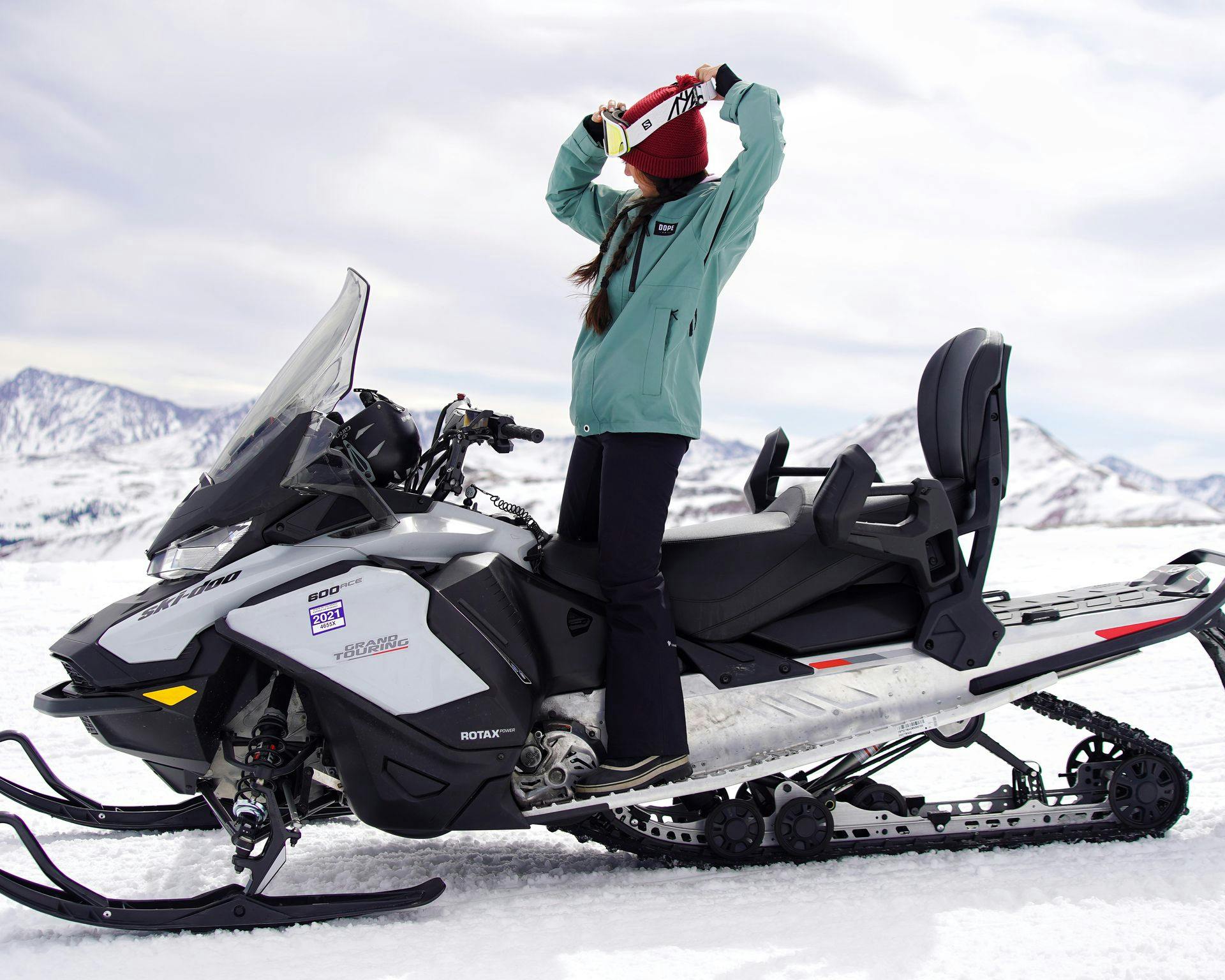 Bukitt's co-founder riding a snowmobile at Vail, Colorado.